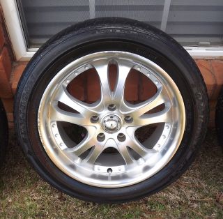 17 inch aluminum rims w/225/50/R17 tires. Offset of +35, 5 X 115 bolt