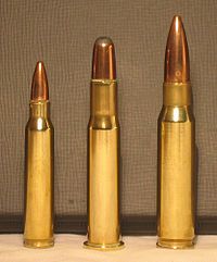 30 30 cartridge (Center) between 5.56x45mm NATO (.223 Remington