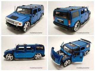 Hummer H2 blau, Modellauto 1:24 / Jada Toys