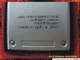 Microelekronik Taschenrechner MR 609 mit Hülle von Texas Instruments