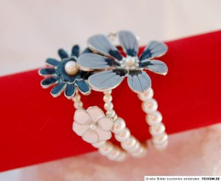 Reihen weiße Perlen 4 Blumen Armband elastisch Perlmutt schwarz