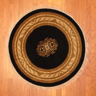 Indo Hand knotted Tibetan Black/ Ivory Wool Rug (4 Round) Today: $254